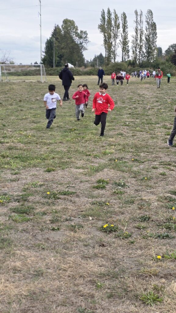 Students running the route in their House colours